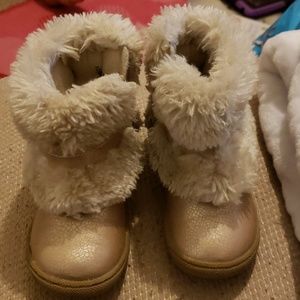 Gold and fur boots